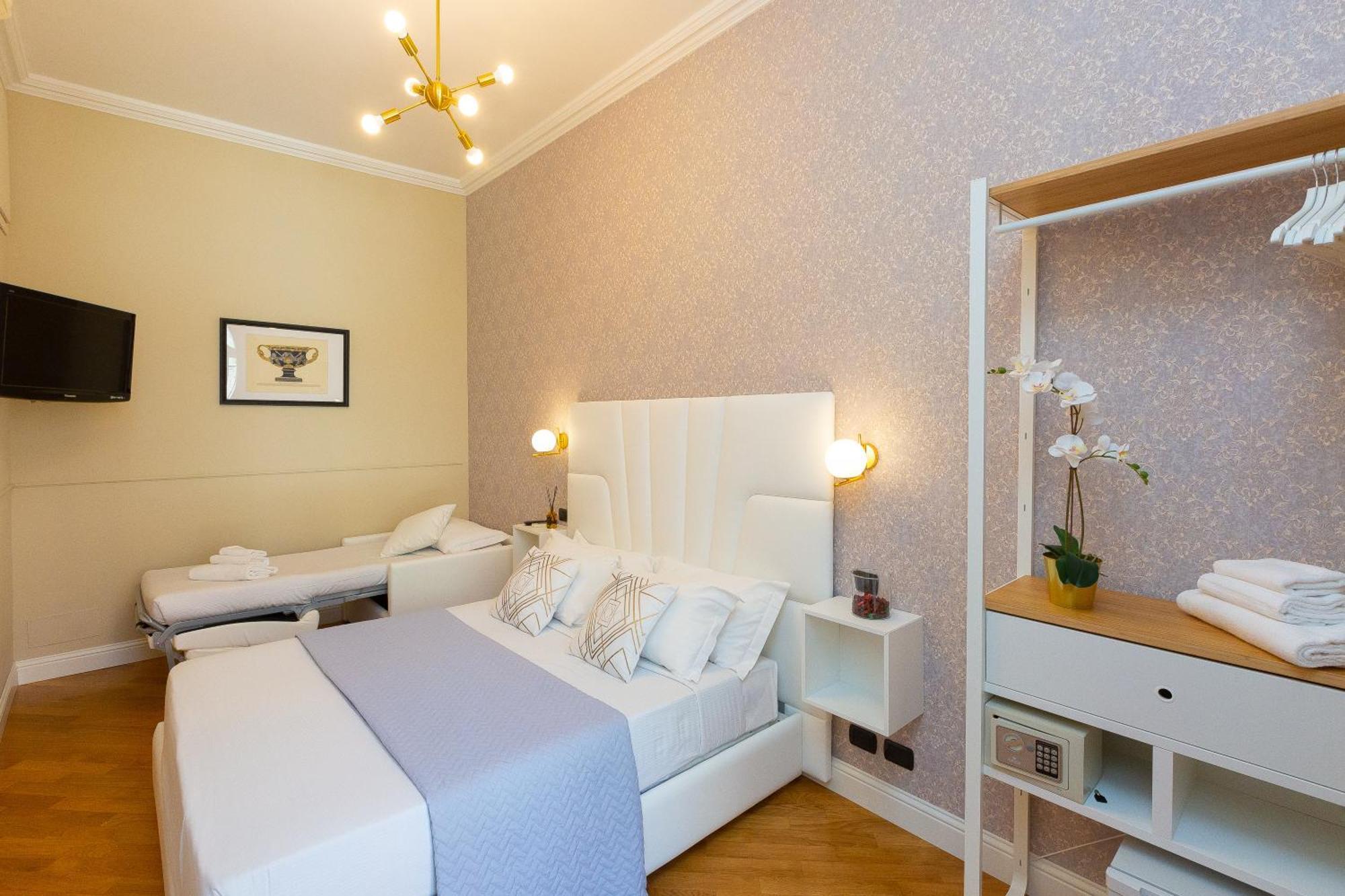 רומא 52 Vespasiano Vatican Suites חדר תמונה