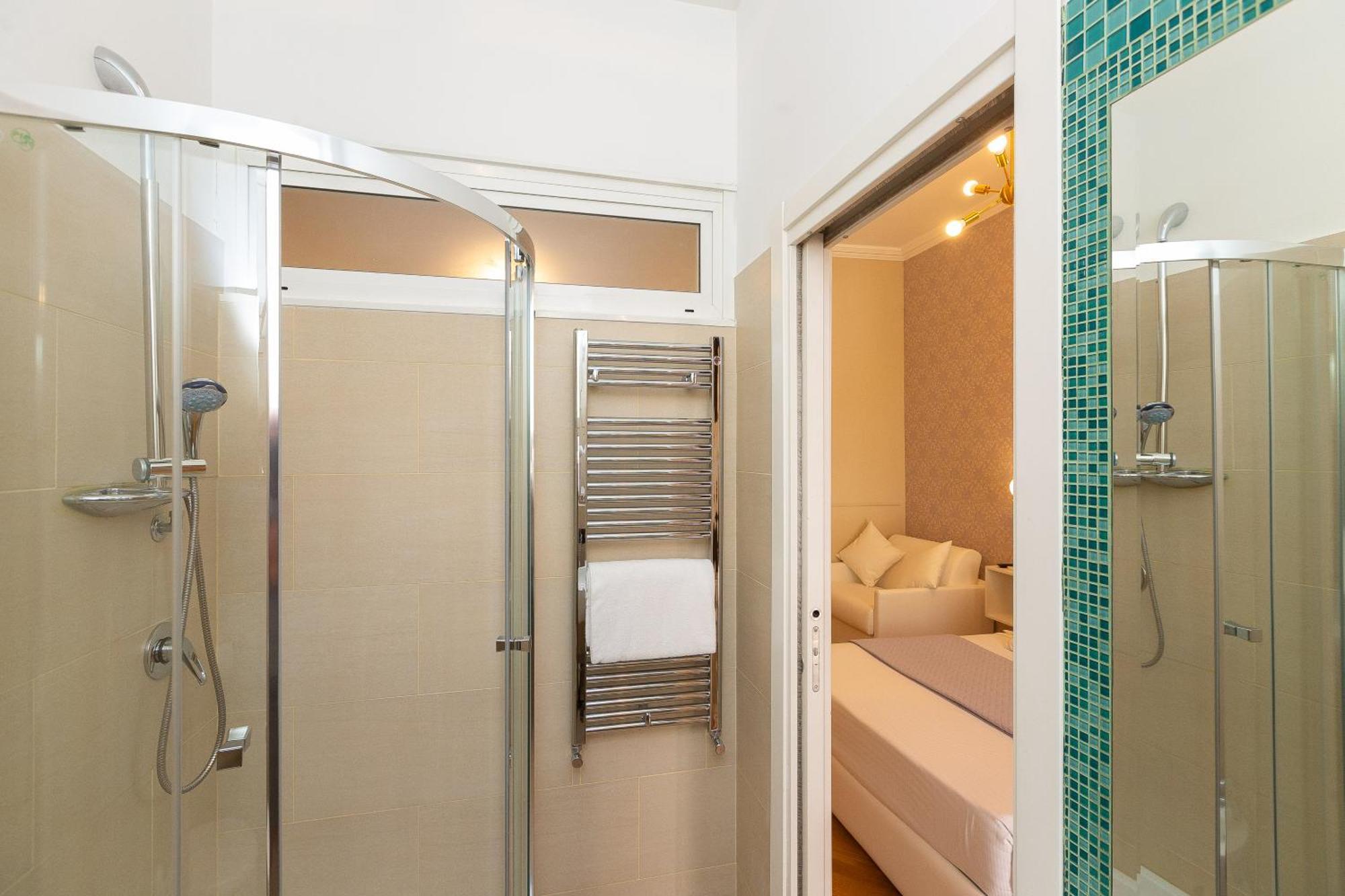 רומא 52 Vespasiano Vatican Suites חדר תמונה